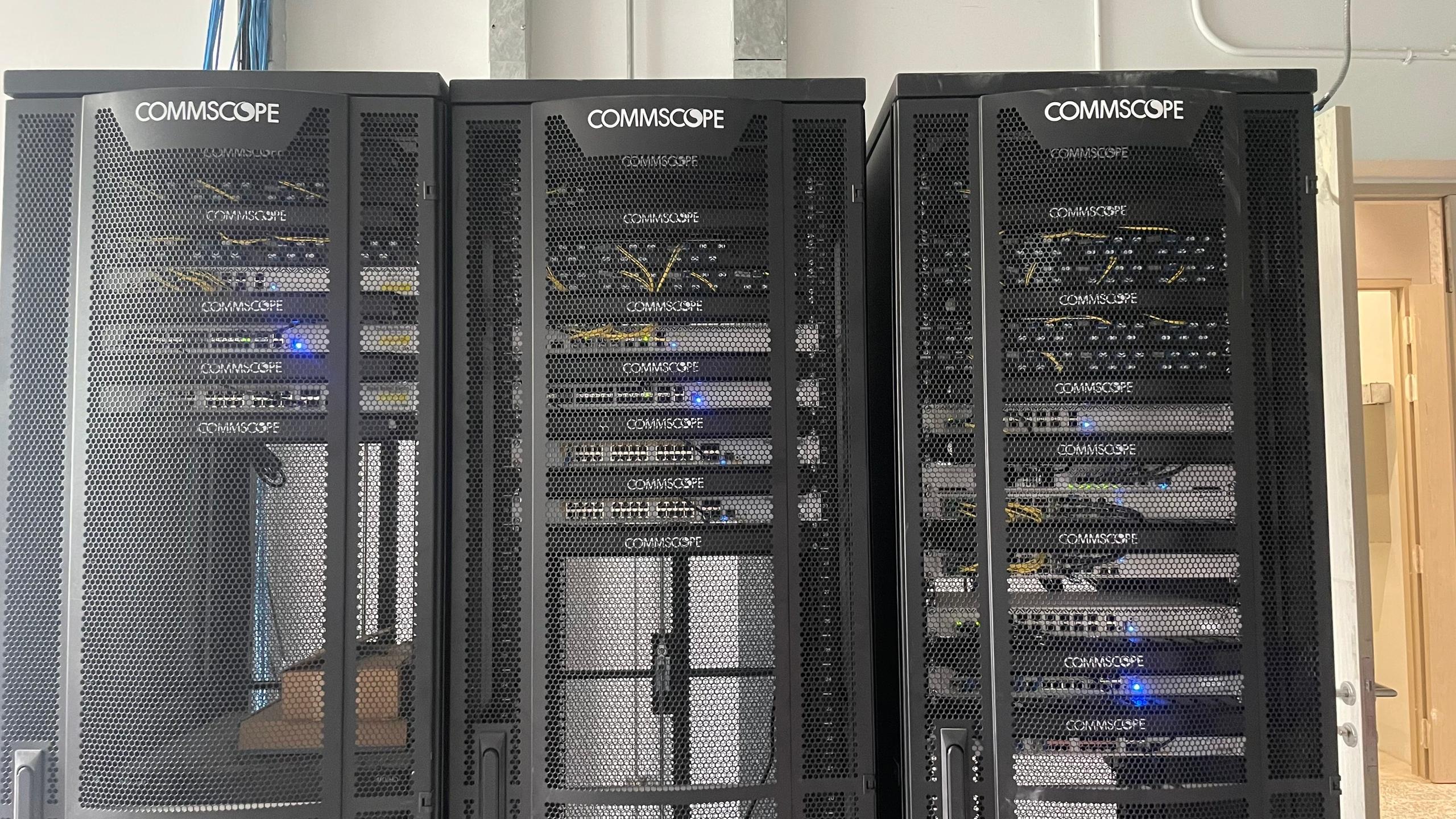 Campus building core racks housing distribution and aggregation switches